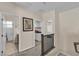 Hallway leading to bathroom, laundry room and bedroom at 7854 Brianna Cheerful Ave, Las Vegas, NV 89178