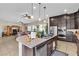 Open kitchen featuring granite counters, stainless steel appliances, and ample cabinet space at 7854 Brianna Cheerful Ave, Las Vegas, NV 89178