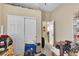 Unstaged spare room with double door closet and lots of natural light at 7854 Brianna Cheerful Ave, Las Vegas, NV 89178