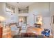 Bright, open-concept living room boasts high ceilings, modern flooring, and stylish decor at 8221 Ebony Peak St, Las Vegas, NV 89143