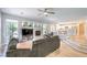 Comfortable living room with a fireplace, plush seating, and an open floor plan at 8221 Ebony Peak St, Las Vegas, NV 89143