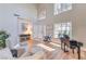 Elegant living room features a high ceiling, hardwood floors, and lots of natural light at 8221 Ebony Peak St, Las Vegas, NV 89143