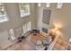 Bright, open living room boasts high ceilings, a fireplace, and lots of natural light at 8221 Ebony Peak St, Las Vegas, NV 89143