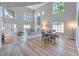 Expansive living space with high ceilings, hardwood floors, and lots of natural light at 8221 Ebony Peak St, Las Vegas, NV 89143