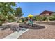 Community playground with shade structure and modern play equipment at 8221 Ebony Peak St, Las Vegas, NV 89143