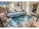 A private hot tub offers a serene retreat, perfect for relaxation and rejuvenation at 8324 Tide Pool Dr, Las Vegas, NV 89128