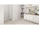Bathroom with white cabinets and white paint at 8575 Nicholas James Ave, Las Vegas, NV 89143