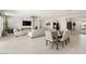 Open-concept with fireplace and tile flooring at 8575 Nicholas James Ave, Las Vegas, NV 89143