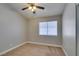 Bedroom featuring large windows and carpeted floors at 87 Ginger Lily Ter, Henderson, NV 89074