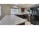 Kitchen boasts modern appliances, light countertops and plenty of light at 87 Ginger Lily Ter, Henderson, NV 89074