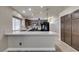Kitchen features ample counter space, stainless steel appliances, and natural light at 87 Ginger Lily Ter, Henderson, NV 89074