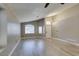 Bright living room features hardwood floors and plenty of natural light at 87 Ginger Lily Ter, Henderson, NV 89074