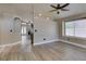 Open-concept living area with modern flooring and neutral paint at 87 Ginger Lily Ter, Henderson, NV 89074