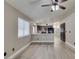 Living room features an open-concept design and hardwood flooring at 87 Ginger Lily Ter, Henderson, NV 89074