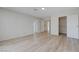 Spacious bedroom with modern flooring, neutral walls, and ample closet space, offering versatility at 8809 Beach Front Dr, Las Vegas, NV 89117