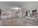 Spacious two-car garage featuring insulated doors, ample storage, and utility connections at 8809 Beach Front Dr, Las Vegas, NV 89117