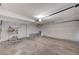 Large two-car garage with ample storage and an entrance door at 8809 Beach Front Dr, Las Vegas, NV 89117