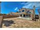 Large backyard with concrete patio and pergola offering a blend of outdoor and indoor living at 901 Carnival Ave, Las Vegas, NV 89123