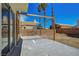An open backyard with a swing, covered patio, and clear skies for Gathering enjoyment at 901 Carnival Ave, Las Vegas, NV 89123