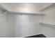 The walk-in closet features sleek modern flooring and bright white shelving at 901 Carnival Ave, Las Vegas, NV 89123