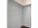 A bright walk-in closet featuring neutral walls and a standard clothes rod for organization at 901 Carnival Ave, Las Vegas, NV 89123
