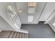 High angle view of living room with fireplace and stairway at 901 Carnival Ave, Las Vegas, NV 89123