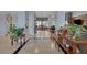 Spacious foyer with tiled flooring leading into the home's open concept living space at 9015 S Tenaya Way, Las Vegas, NV 89113