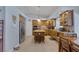 Beautiful kitchen features a central island with seating, stainless steel appliances, and granite counters at 9015 S Tenaya Way, Las Vegas, NV 89113