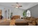 Spacious living room with wood floors, plants, and neutral-toned furniture at 9015 S Tenaya Way, Las Vegas, NV 89113