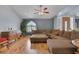 Comfortable living room with wood floors, neutral furniture, and plenty of light at 9015 S Tenaya Way, Las Vegas, NV 89113
