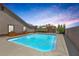 Private backyard oasis with a large swimming pool, perfect for relaxation and recreation at 9015 S Tenaya Way, Las Vegas, NV 89113