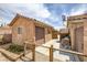 Backyard shed with roll up door provides secure and convenient storage at 9015 S Tenaya Way, Las Vegas, NV 89113