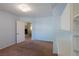 Hallway featuring a full wall closet with storage and an open bedroom entry at 902 Possum Hill St, Henderson, NV 89014