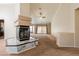 Bright living room with fireplace, open floor plan, and easy access to the kitchen at 902 Possum Hill St, Henderson, NV 89014