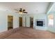 Bedroom with a fireplace and access to closets and bathroom at 902 Possum Hill St, Henderson, NV 89014