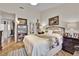 Charming bedroom featuring a bed, artwork, and elegant furniture for relaxation at 9237 Quail Ridge Dr, Las Vegas, NV 89134