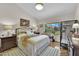 Bright bedroom with a window view and classic furnishings exudes a peaceful ambiance at 9237 Quail Ridge Dr, Las Vegas, NV 89134