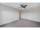Bedroom featuring ceiling fan, neutral carpet and closet at , Henderson, NV 89015