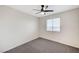 This bedroom offers neutral paint, carpet flooring, ceiling fan and window at , Henderson, NV 89015