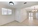 Bright dining room featuring neutral tile flooring and view into the kitchen at , Henderson, NV 89015