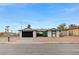 Charming single story house with a black garage door and low maintenance landscaping at , Henderson, NV 89015