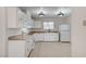 Cozy kitchen features white cabinets, wood countertops and tile flooring at , Henderson, NV 89015