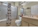 Bathroom featuring a tub shower, toilet and vanity area at 10017 Bundella Dr, Las Vegas, NV 89134