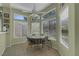 Open dining area surrounded by bay windows allowing for ample natural light at 10017 Bundella Dr, Las Vegas, NV 89134