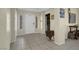 Inviting foyer with tile flooring and neutral paint, leading into the main living spaces at 10017 Bundella Dr, Las Vegas, NV 89134