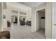 Open-concept living area with tile floors seamlessly connects living spaces and the backyard at 10017 Bundella Dr, Las Vegas, NV 89134