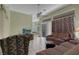 Cozy living room with tile flooring and comfortable seating arrangement at 10017 Bundella Dr, Las Vegas, NV 89134
