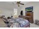 Main bedroom featuring tile flooring, and furniture with a ceiling fan at 10017 Bundella Dr, Las Vegas, NV 89134