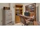 This office features a desk with cabinets and a file cabinet for workspace and storage at 10017 Bundella Dr, Las Vegas, NV 89134