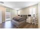 Stylish bedroom with hardwood floors, sliding door access to a private outdoor space at 10711 Silver Pond Ave, Las Vegas, NV 89135
